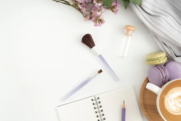 A flat lay of essential makeup products on a clean white surface, including concealer, mascara, blush, and lip gloss, demonstrating the minimalist approach to a 5-minute makeup routine.