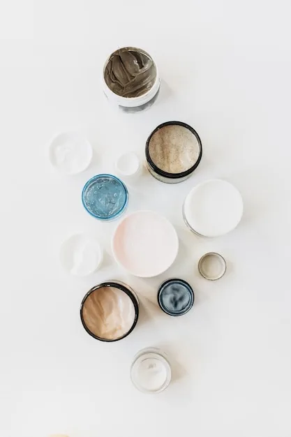 Close-up shot of a diverse group of skincare products, including serums, moisturizers, and exfoliants, arranged on a clean, white surface with soft, natural lighting.