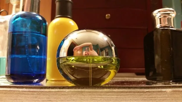 A close-up shot of various perfume bottles displayed on a vanity table next to a selection of WePink Shein clothing items. The lighting is soft and diffused, highlighting the textures and colors of both the perfumes and outfits.