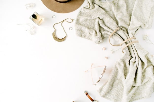 A flat lay of a well-coordinated casual outfit with a pop of color: a gray sweater, dark wash jeans, white sneakers, and a bright yellow scarf. The composition is clean and visually appealing, emphasizing the scarf as the focal point.