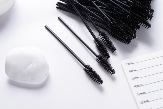 A set of eyelash extension aftercare products, including a gentle cleanser, soft brush, and mascara wand, displayed neatly on a clean surface to emphasize the importance of daily maintenance.