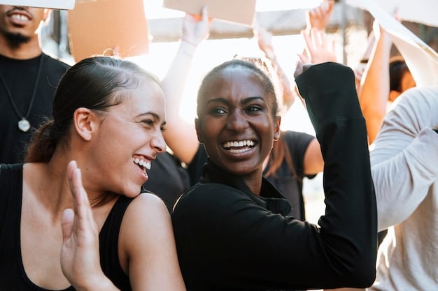 A diverse group of people celebrating success and supporting each other, with a sense of community and shared achievement.