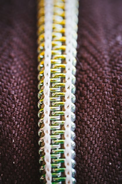A close-up shot of a neatly stitched seam on a garment, showing even and tight stitching with no loose threads.