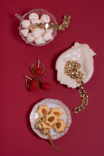A close-up detailed shot showcasing various pieces from Shein's Date Night Collection laid out on a clean surface. Items include a silk slip dress, a lace top, high-waisted trousers, and accessories like delicate jewelry. All items are visually appealing and arranged to highlight their textures and design.