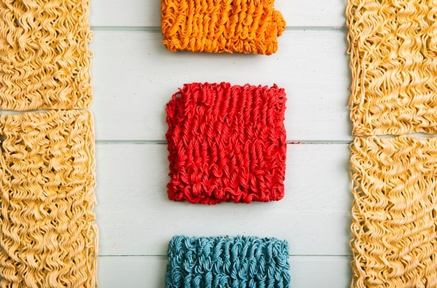 A close-up shot of various fabric swatches, showcasing different textures and materials available from Shein. The swatches include cotton, linen, denim, and a few synthetic blends. The image highlights the importance of considering fabric quality when selecting items for a capsule wardrobe.